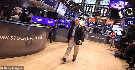 NEW YORK, NEW YORK - AUGUST 12: Traders work on the floor of the New York Stock Exchange during morning trading on August 12, 2024 in New York City. Stocks began to fall after the opening bell as the market awaits key inflation data after a week of volatility amid a global market selloff centered on fears of a U.S. recession. (Photo by Michael M. Santiago/Getty Images)