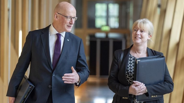 Scotland's First Minister John Swinney and Shona Robison (right) arrive for First Minister's Questions at the Scottish Parliament in Holyrood, Edinburgh. Pictured: Thursday 16 May 2024.