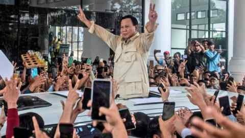 Prabowo Subianto greets supporters during a campaign rally in Medan, North Sumatra, Indonesia, last month.